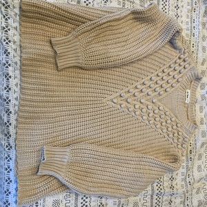 In Loom offwhite cable sweater with Pom detail
